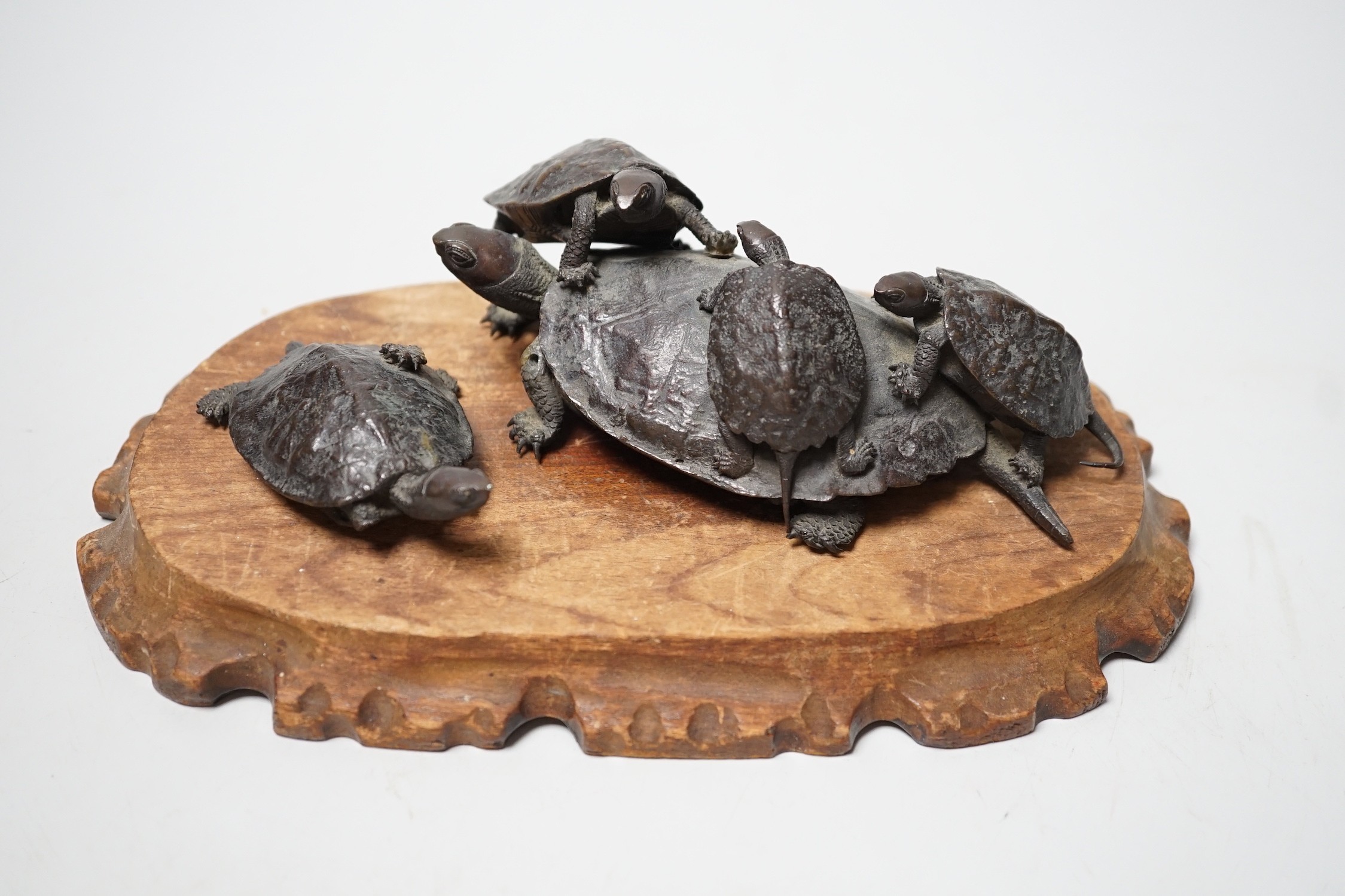 A Japanese Meiji period bronze turtle group, signed to base, (a.f.), 16cm wide